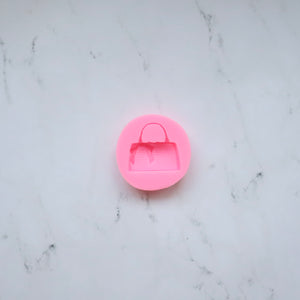 PURSE WITH BOW MOLD