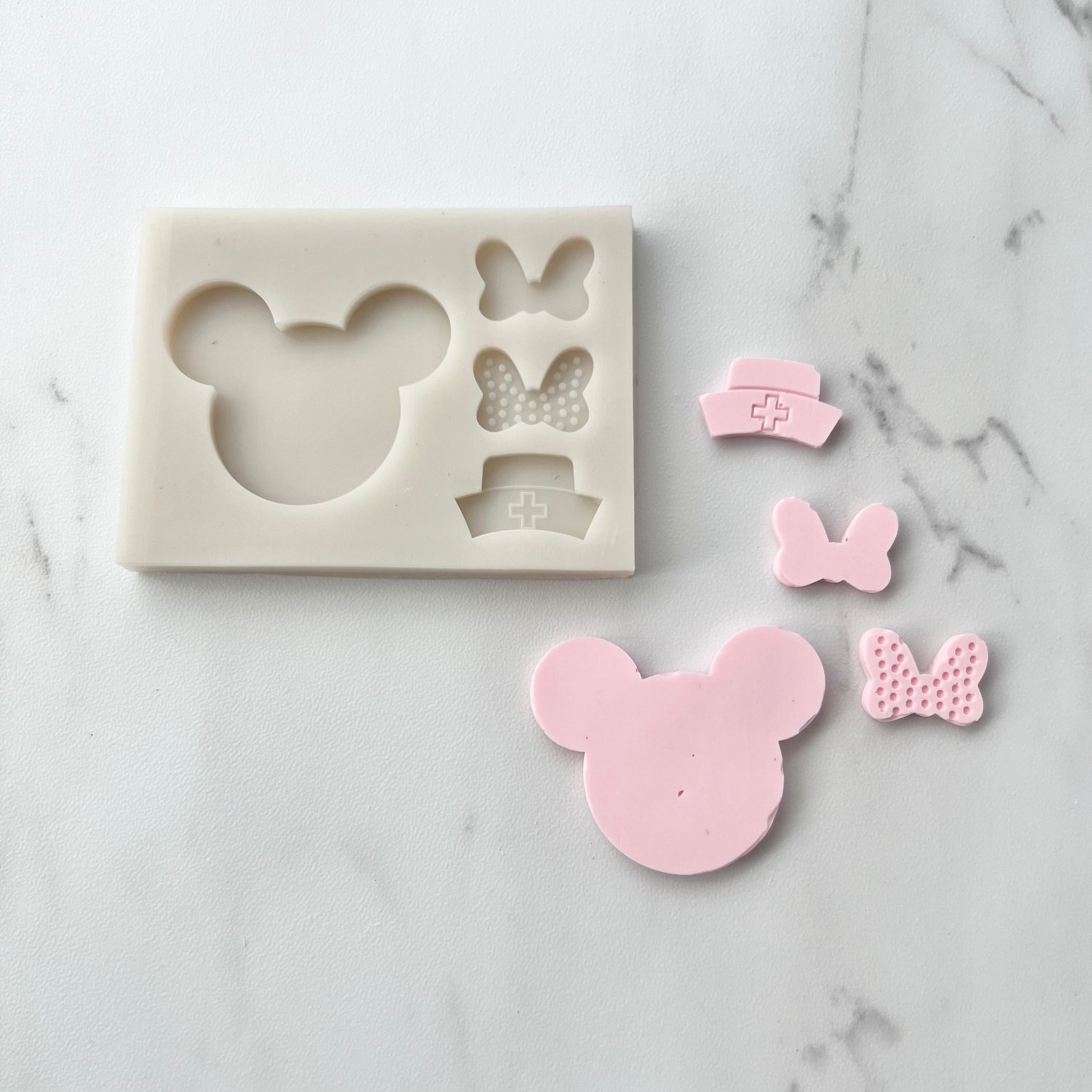 MICKEY SILHOUETTE WITH VARIETY BOW MOLD